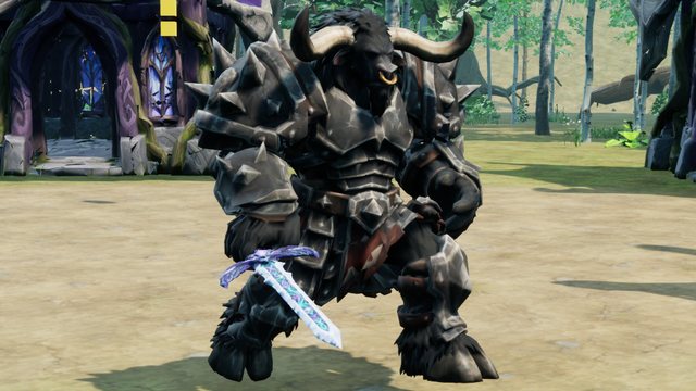 Un tauro corriendo con la espada por delante de las piernas